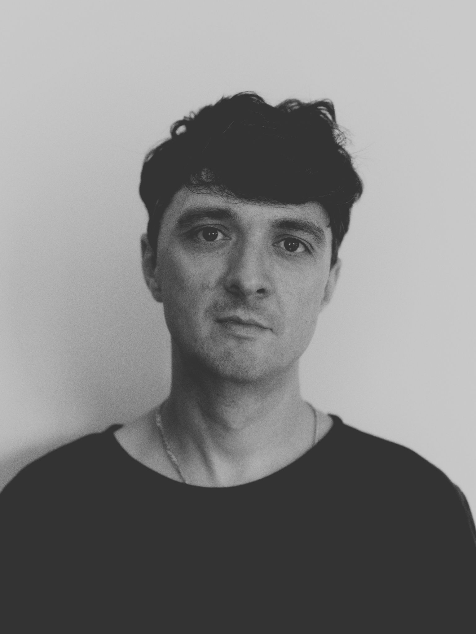 Black and white portrait of Lachlan Anderson